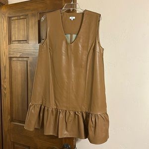 Camel colored, vegan leather mini dress.